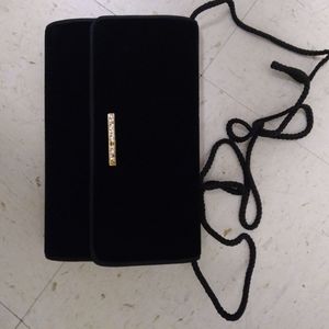 Black suede clutch